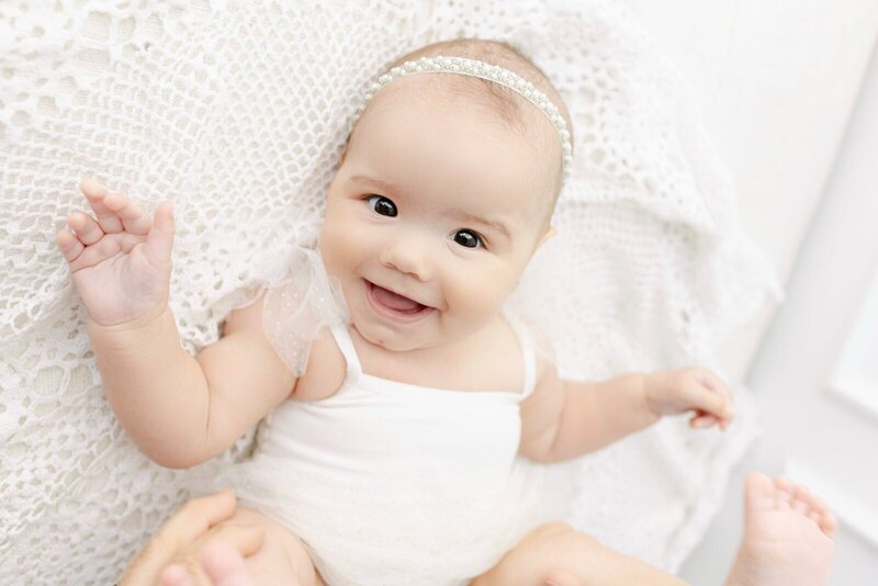 Baby smiling at cake smash photographer nj
