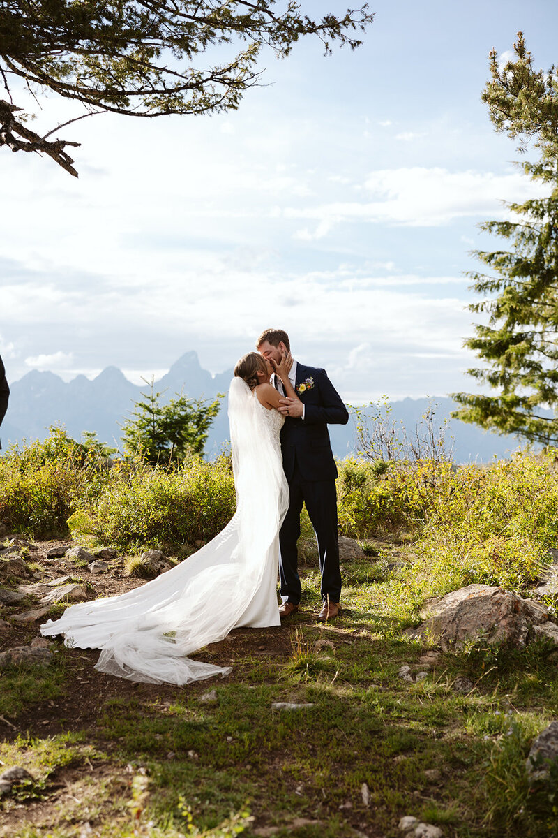 A couple on the shore of Sawtooth Lake in Idaho after their elopement