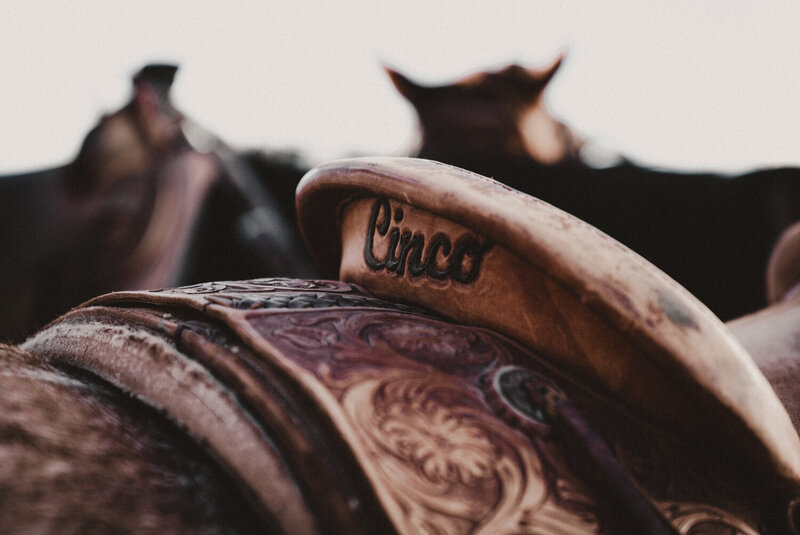 Saddle With "Cinco" Embroidered On It, From The Lore Of The Range Collection