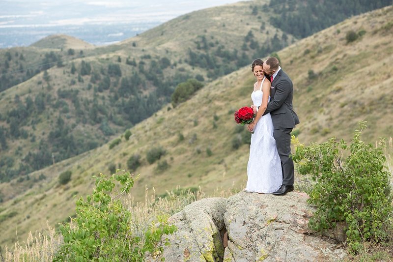 Colorado mountain wedding photographer - Kali & Yates looking out over the mountains in Golden CO