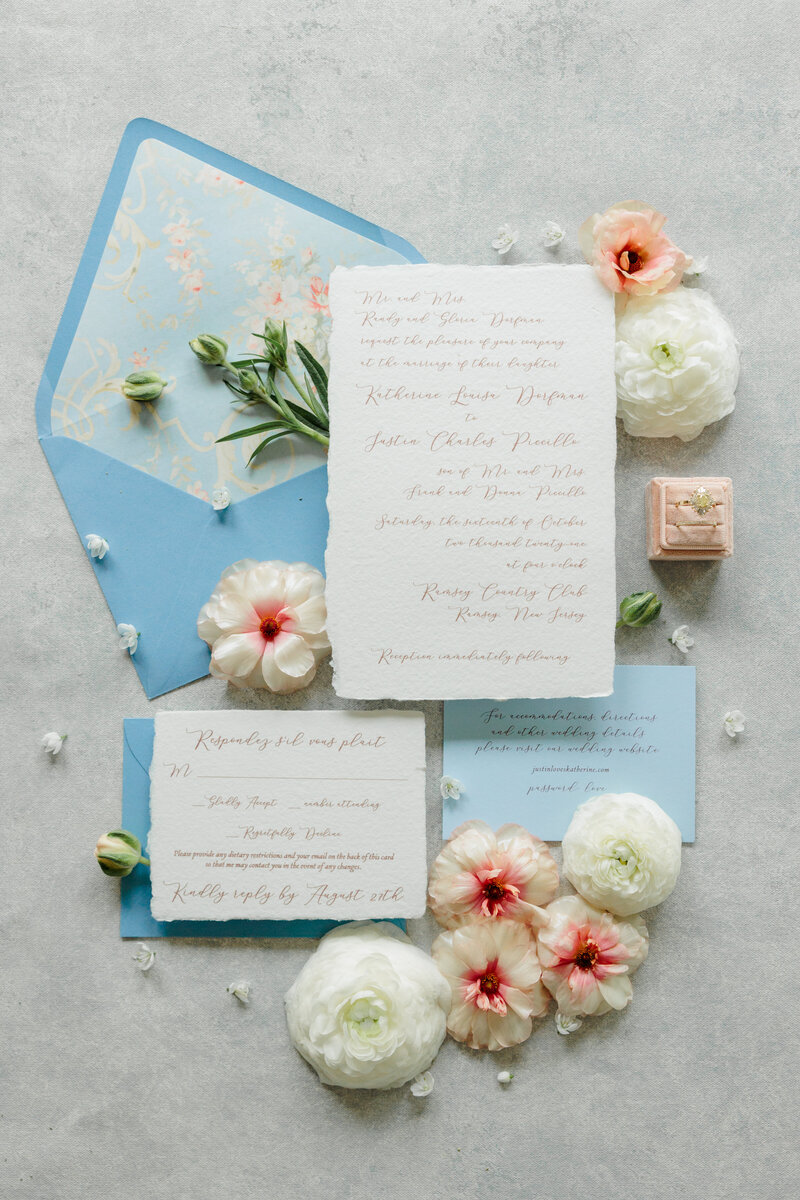 Gorgeous invitations and florals for photography flat lays in Lake Como.
