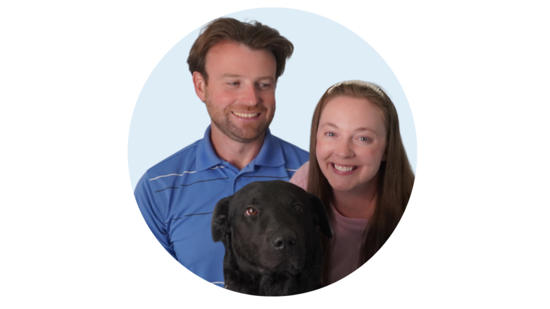 Curt and Krista are modeling with their dog Grufy who comes to the clinic with them for patient support.
