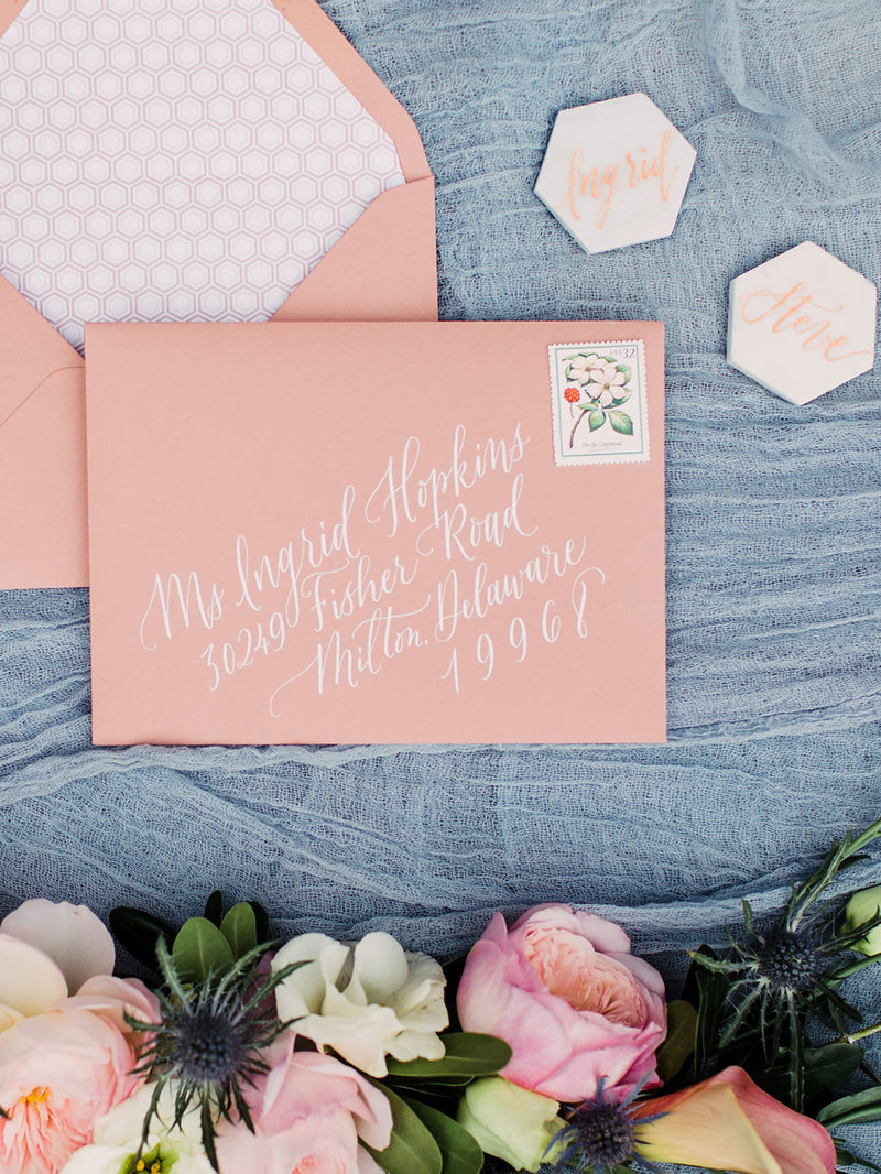 Lovely pink envelopes with white ink calligraphy