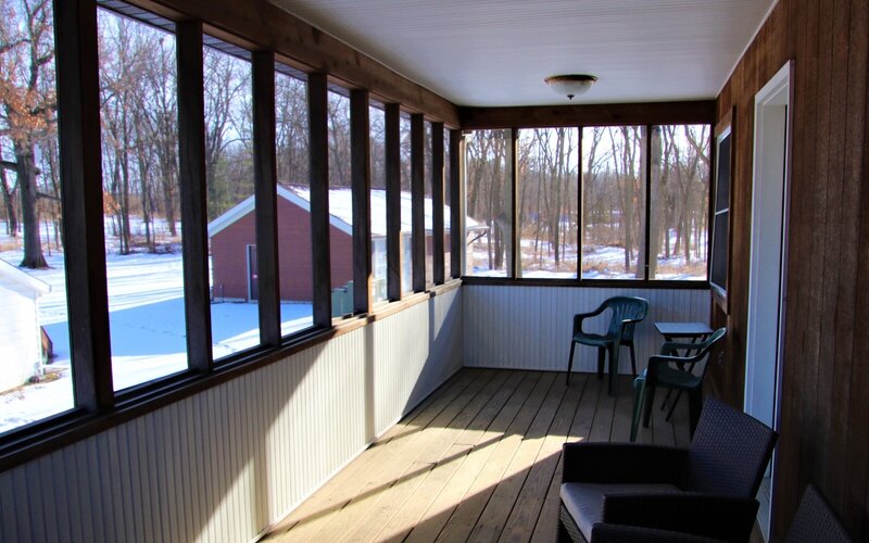 porch at the farmhouse lodging at barnwood events in madison, winconsin.