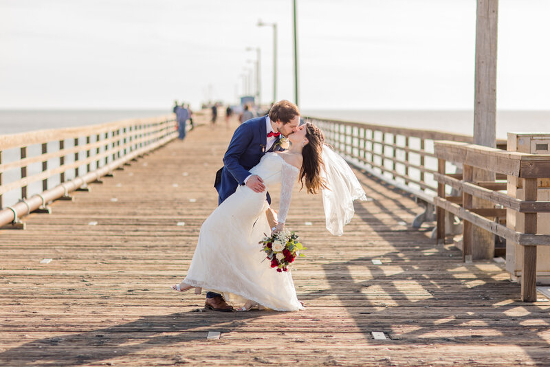 bride and groom portraits on the pier