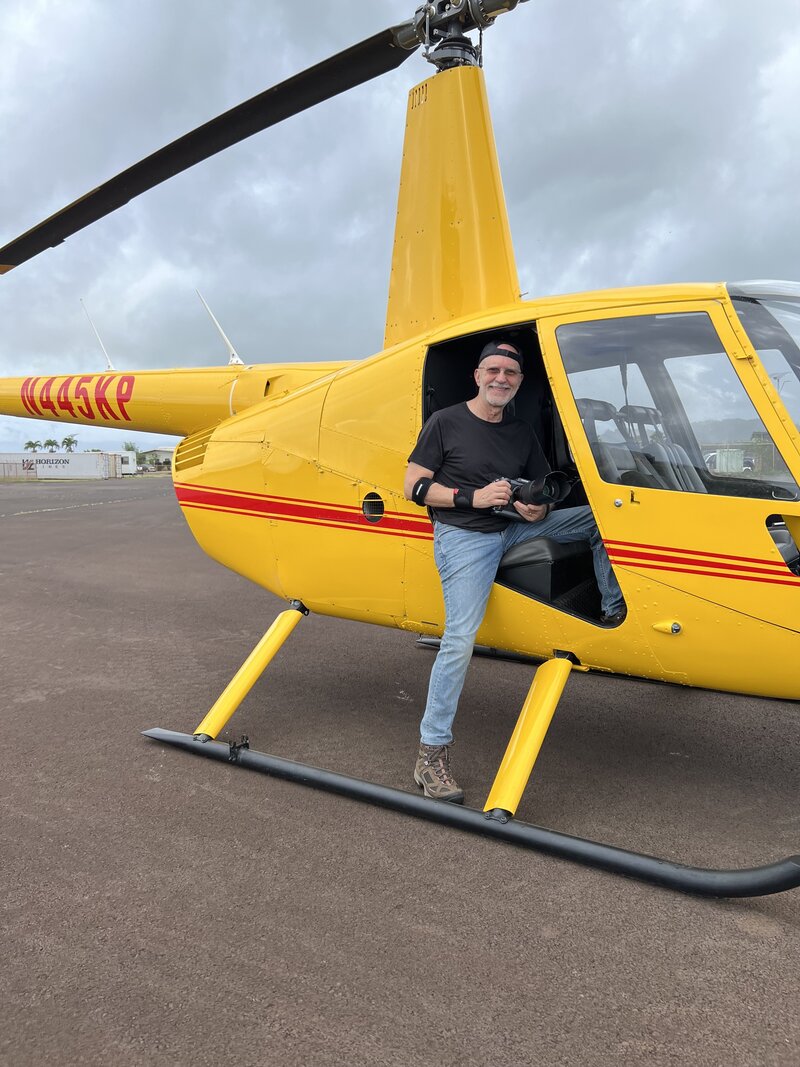 donn delson photographer in yellow helicopter