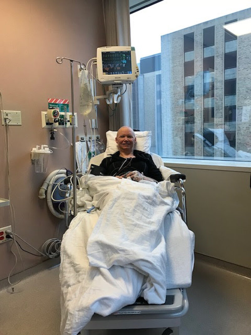 Cancer patient in hospital bed