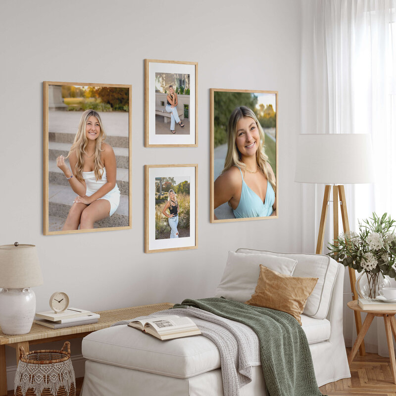 interior living room with 4 wall art pieces in light wood frames on the wall