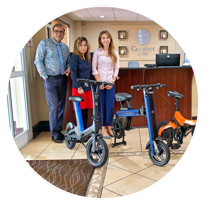 Comfort Inn renting Electric Foldable Bikes. Blue Go-Bike M3; Blue Go-Bike M2 and Orange Go-Bike M4. V&D Electric Bikes