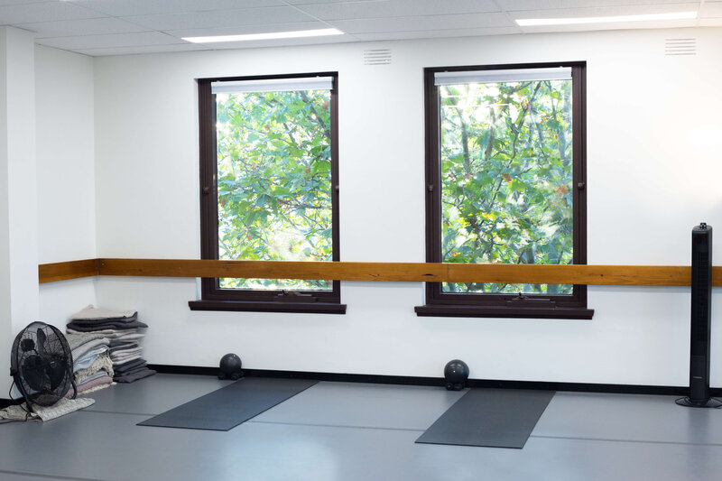 Pilates Studio with large window and tree outside