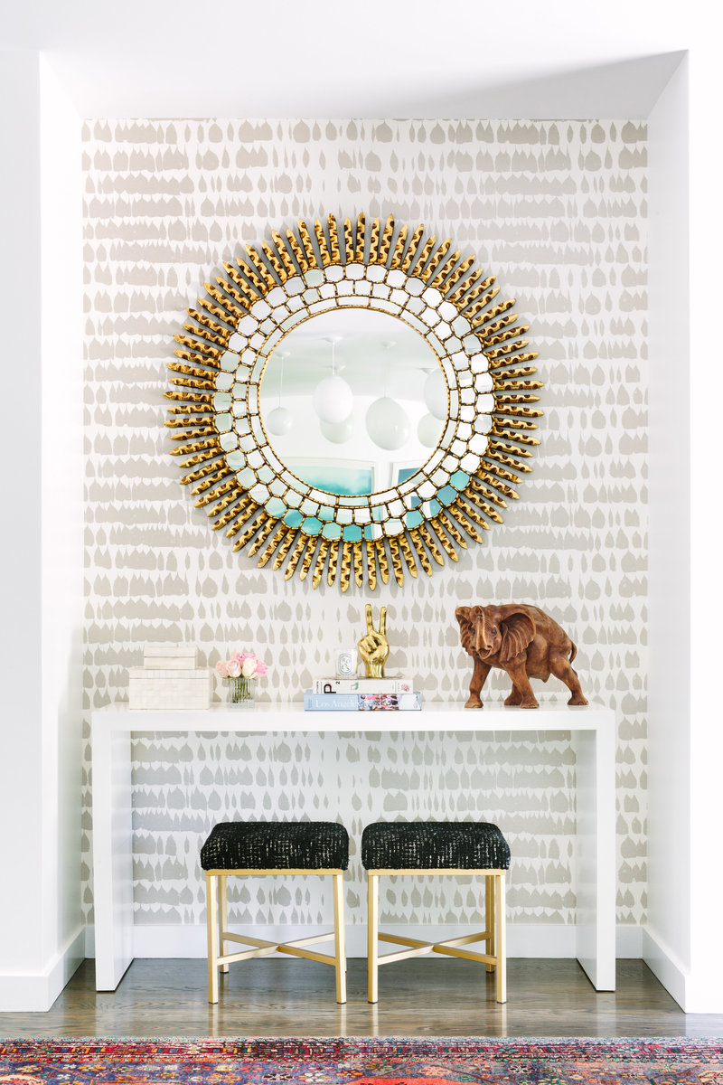 Entryway with Schumacher Queen of Spain wallpaper and Nior Brass peace sign
