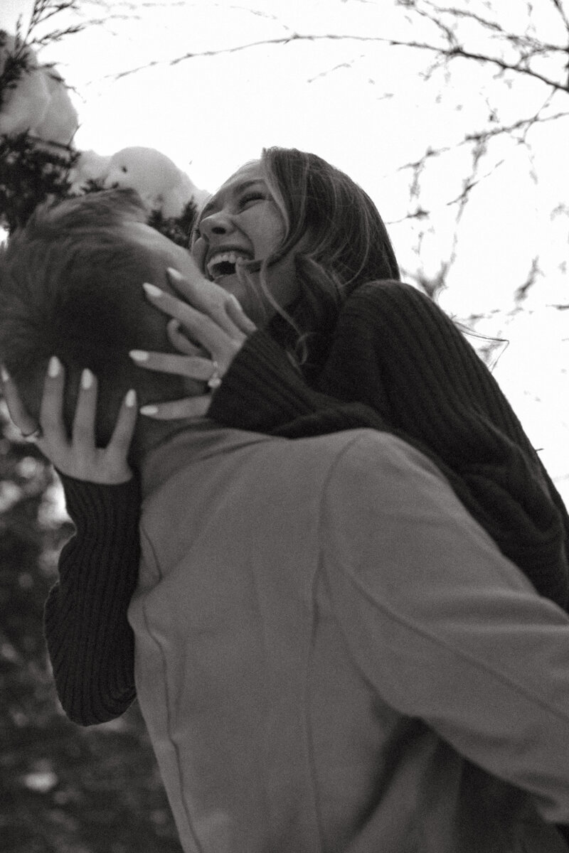 Newlyweds gaze into eachothers eyes on a brisk summer evening