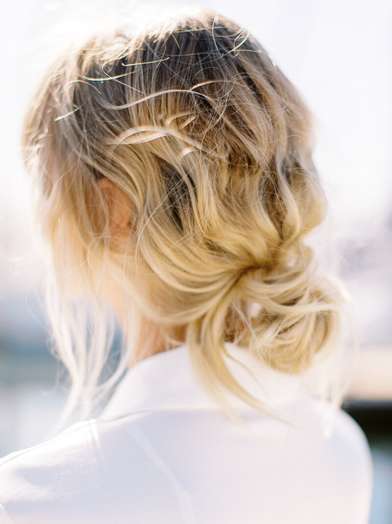 Back of wispy updo editorial hairstyle