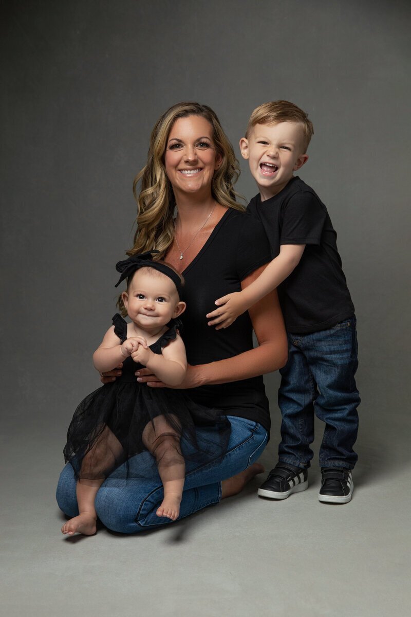Mom with kids in studio by new jersey family photographer