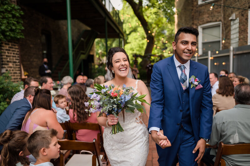 Bride and groom get married outside at The Firehouse Chicago