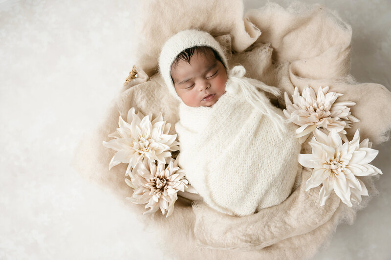 newborn girl sleeping on peach fuzzy blanket } newborn photographer pittsburgh