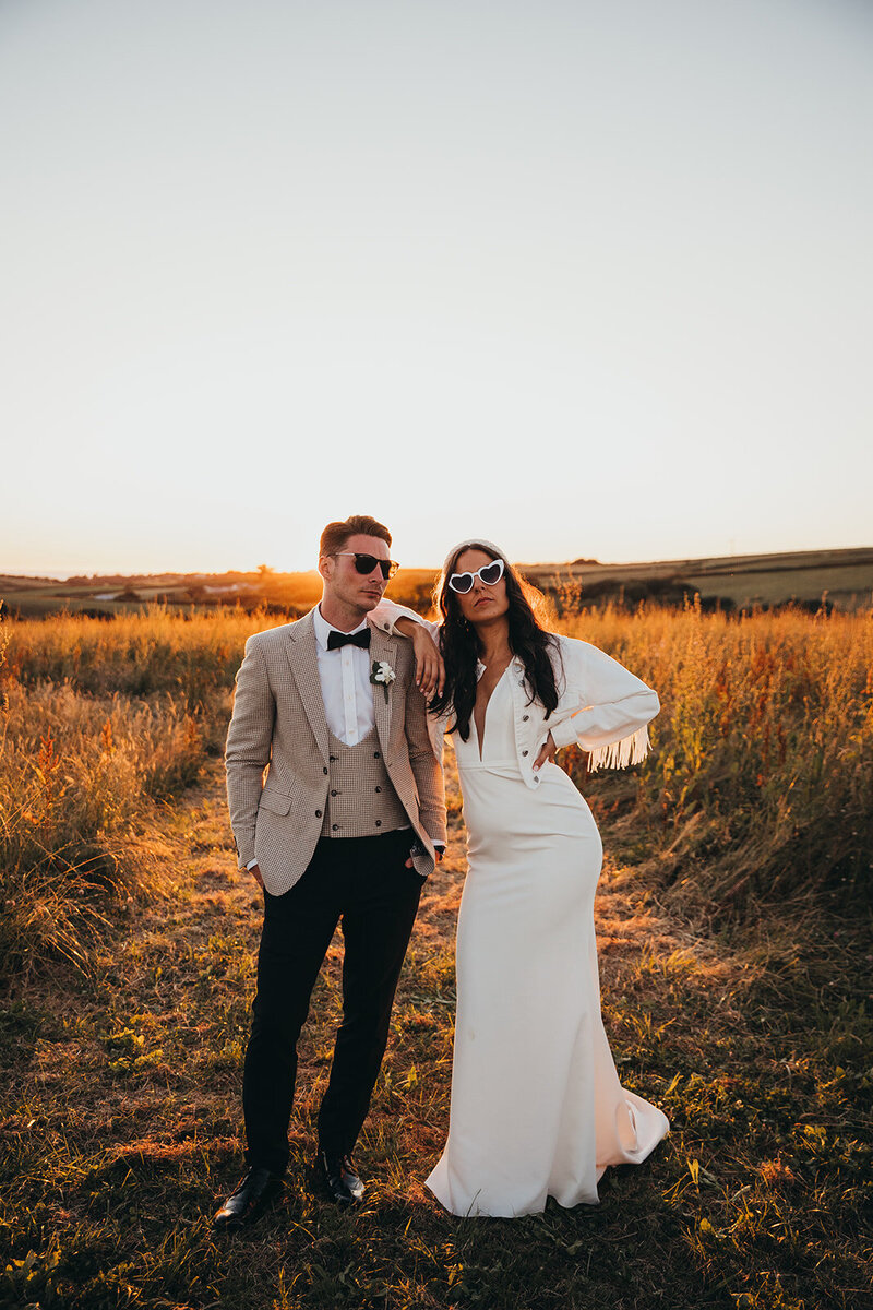 cool looking couple at sunset