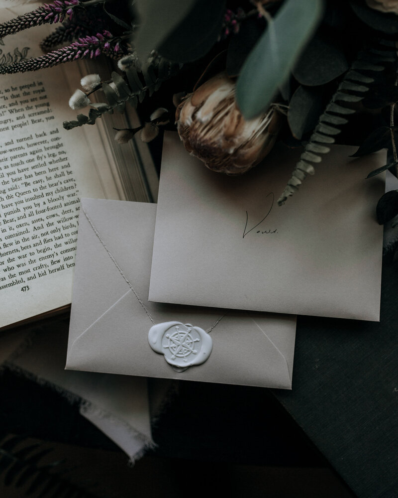 wedding vows in envelopes sealed with wax seals