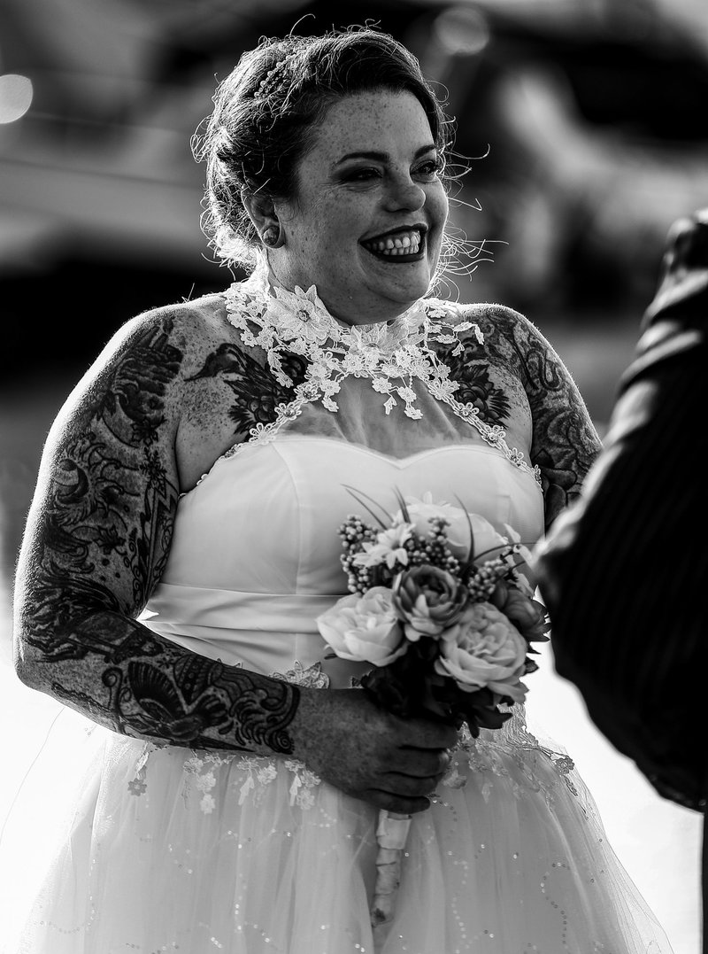 Bride smiling at groom during an Erie Yacht Club wedding