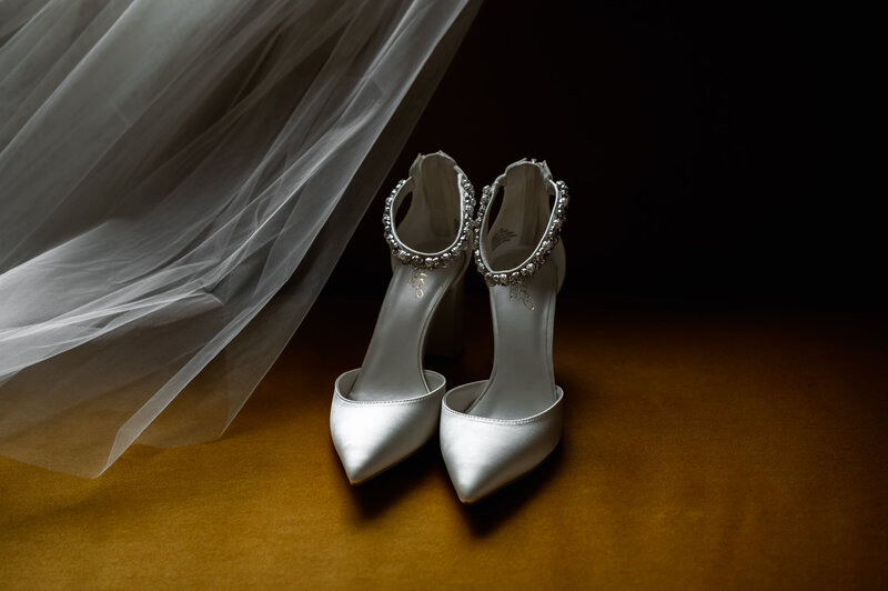 White wedding shoes with pearls