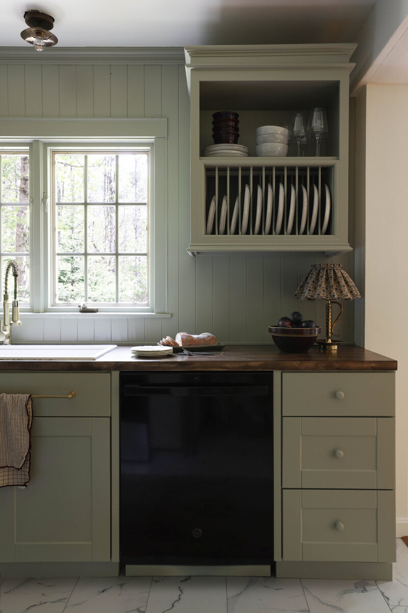 Moody Rustic Laundry Room renovation by Nadine Stay | Dark wood stained walls. Brown painted doors. DIY Ikea Pax hack. DIY mudroom built in cabinet. DIY shaker cabinet doors. DIY inset drawers. Basketweave brick floors.