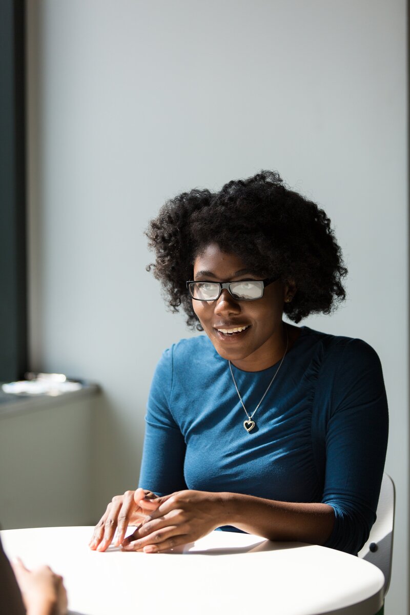 Black woman with glasses
