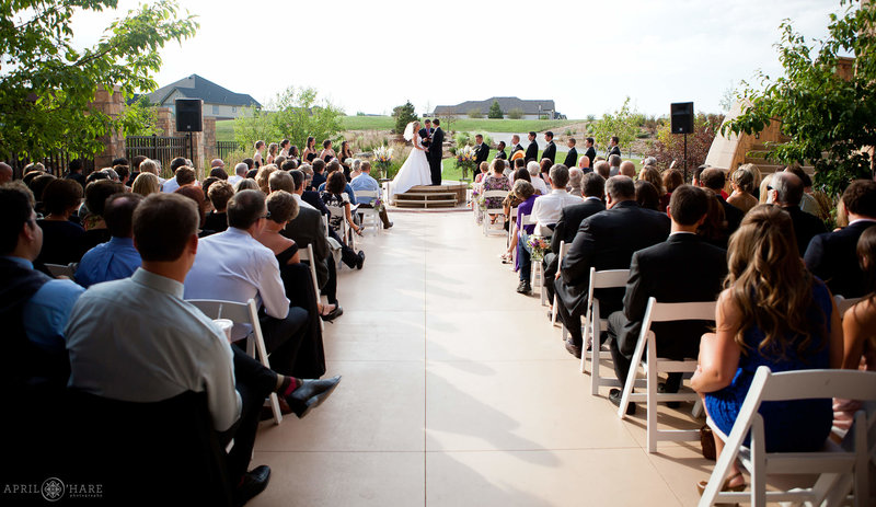 Outdoor-Wedding-Ceremony-at-Heritage-Eagle-Bend-Aurora-Colorado