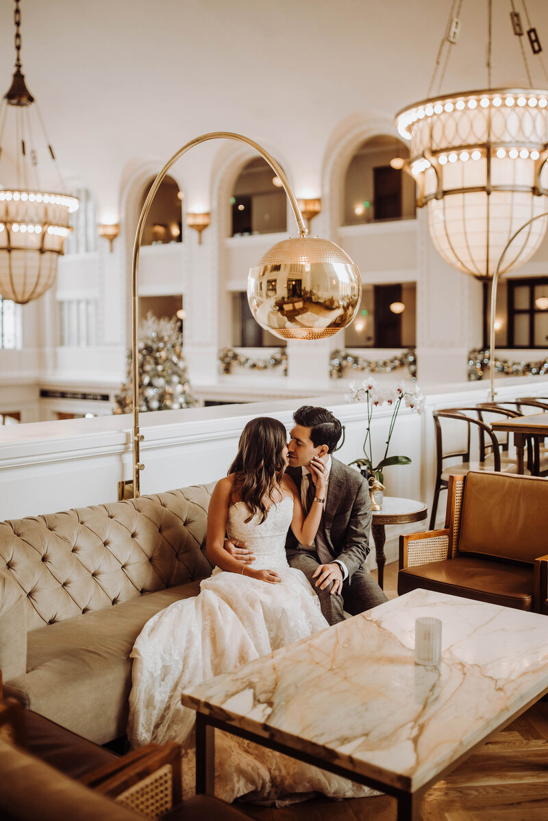 bride-going-in-for-kiss-midcentury-modern-hotel-vibes