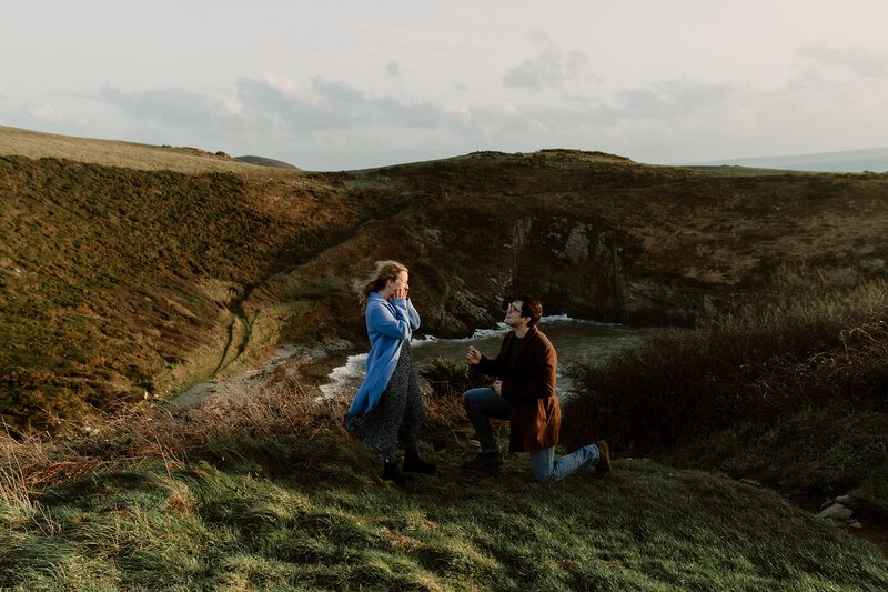 Engaged couples kissing on the beach in Pembrokeshire elopement photography