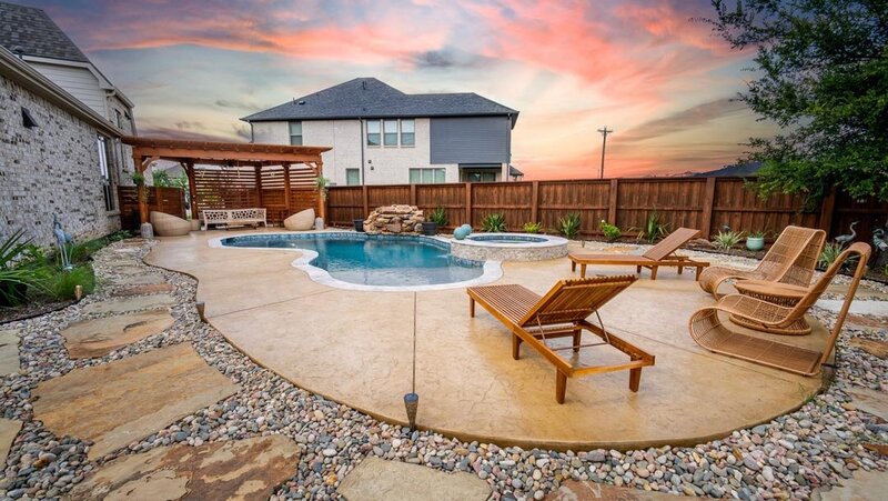 Bee Brush project in Dallas, TX with a custom patio cover and outdoor living space. Designed for relaxation and entertaining.