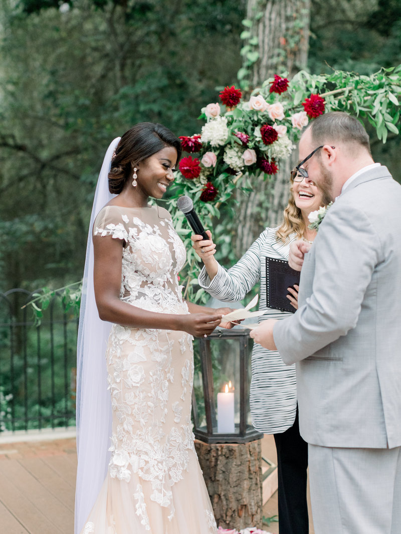 A multicultural couple exchanges rings at Hotel du Village. The couple chose Donna Forsythe of Lehigh Valley Celebrants to be their wedding officiant.