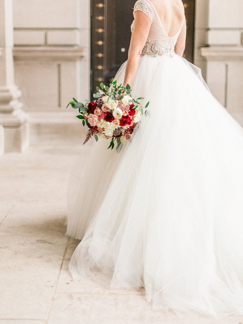 Bride with bouquet in front of Carnegie Institute for Science in Washington DC