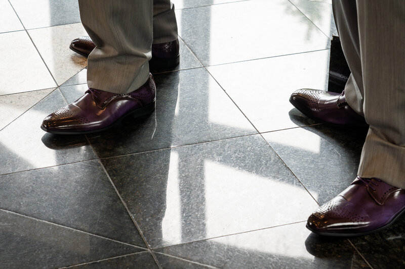 Close-up of groom’s polished brown shoes on wedding day – photographed by wedding photographer Niko Coric – Lumen Clarity Media