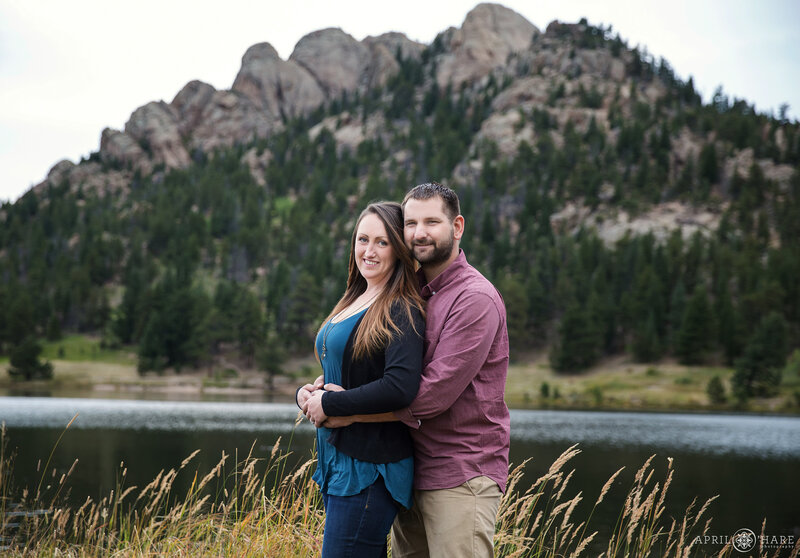 Engagement photo at Lily Lake with Edge of Time Rock in the backdrop
