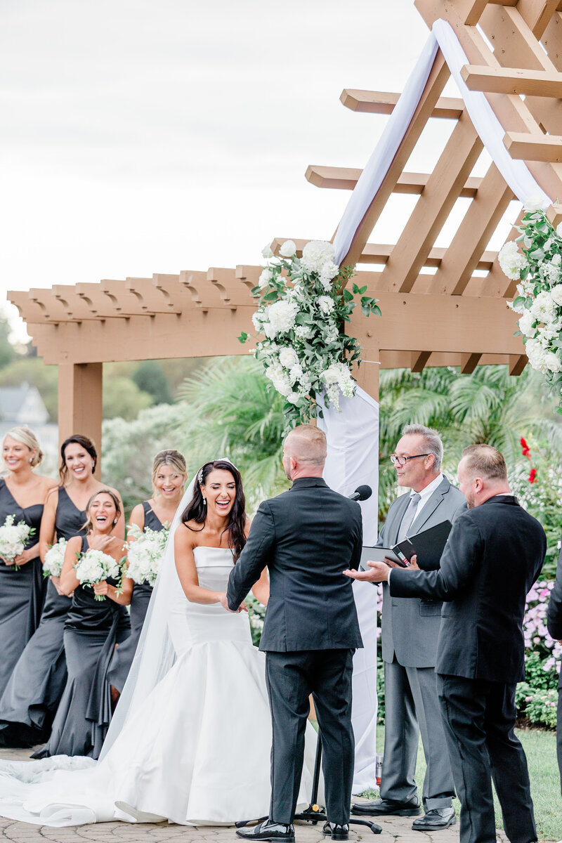 maryland havre de grace wedding photography bride groom looking at each other veil blowing in wind