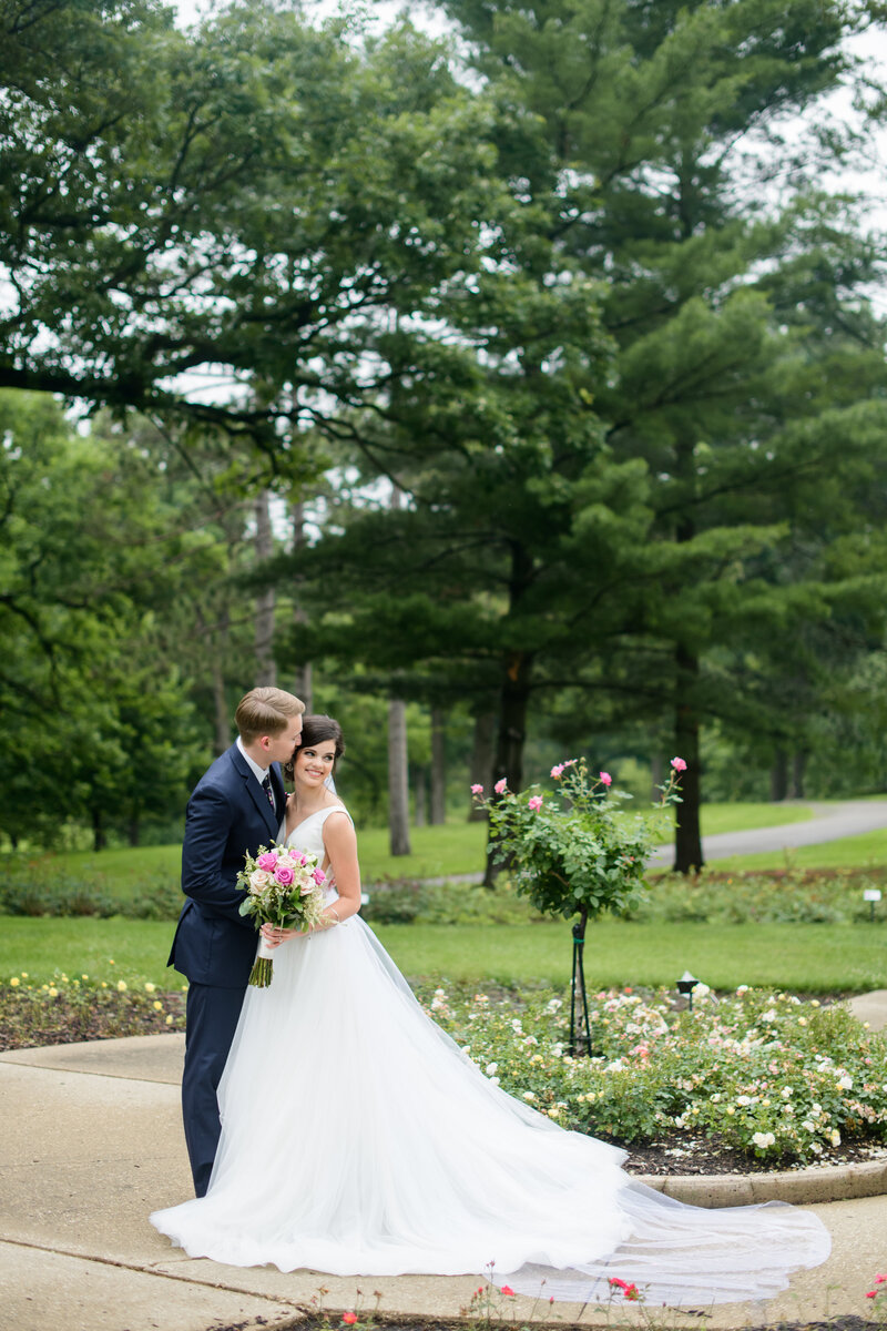 Bride and Groom Portrait in a stunning Iowa Rose Garden