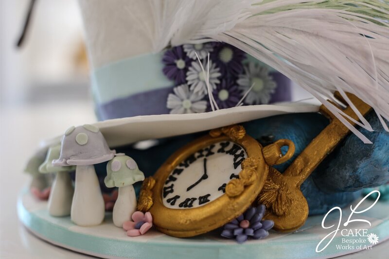spilling teapot cake, cheshire cat cake, mad hatter cake