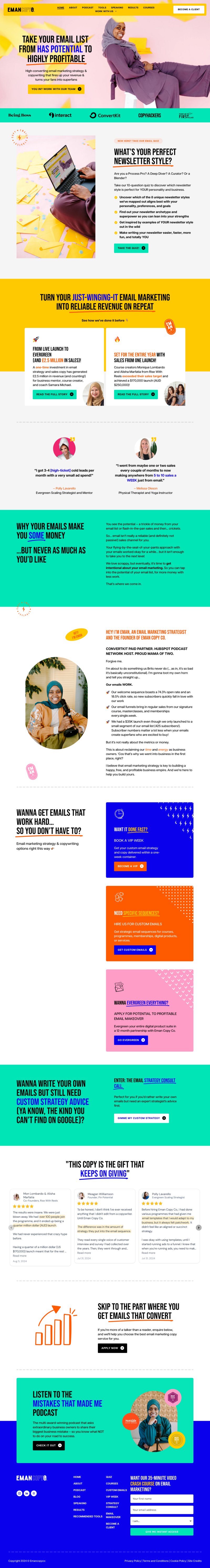 laptop on a table next to a cup of milky coffee