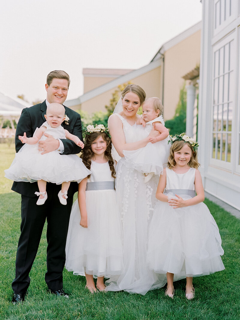 Bride and Groom with Flower Girls