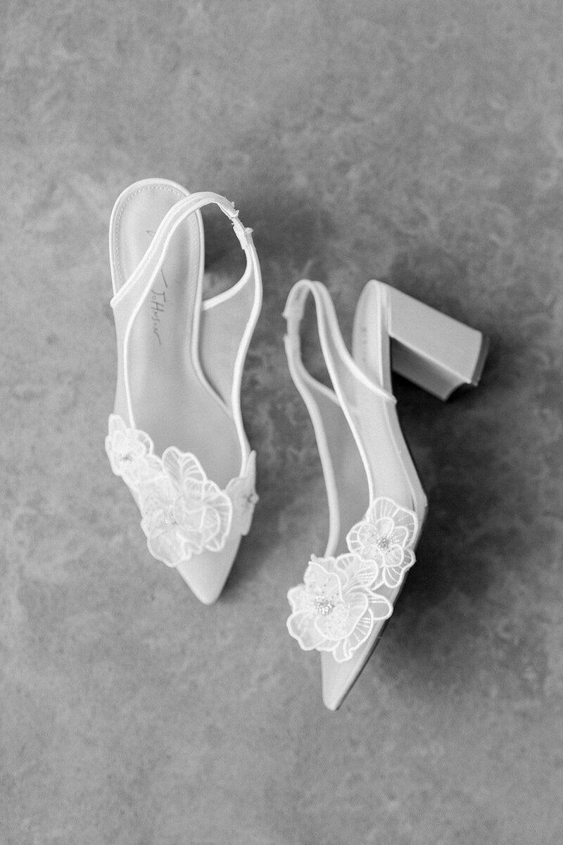 White block heels with floral lace applique captured in soft editorial wedding photography in San Francisco