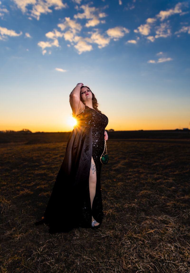 Belinda Gaines photographing a high school senior in Lansing, Michigan using creative off-camera flash lighting.

