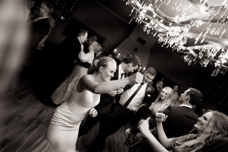 Bride dancing with guests