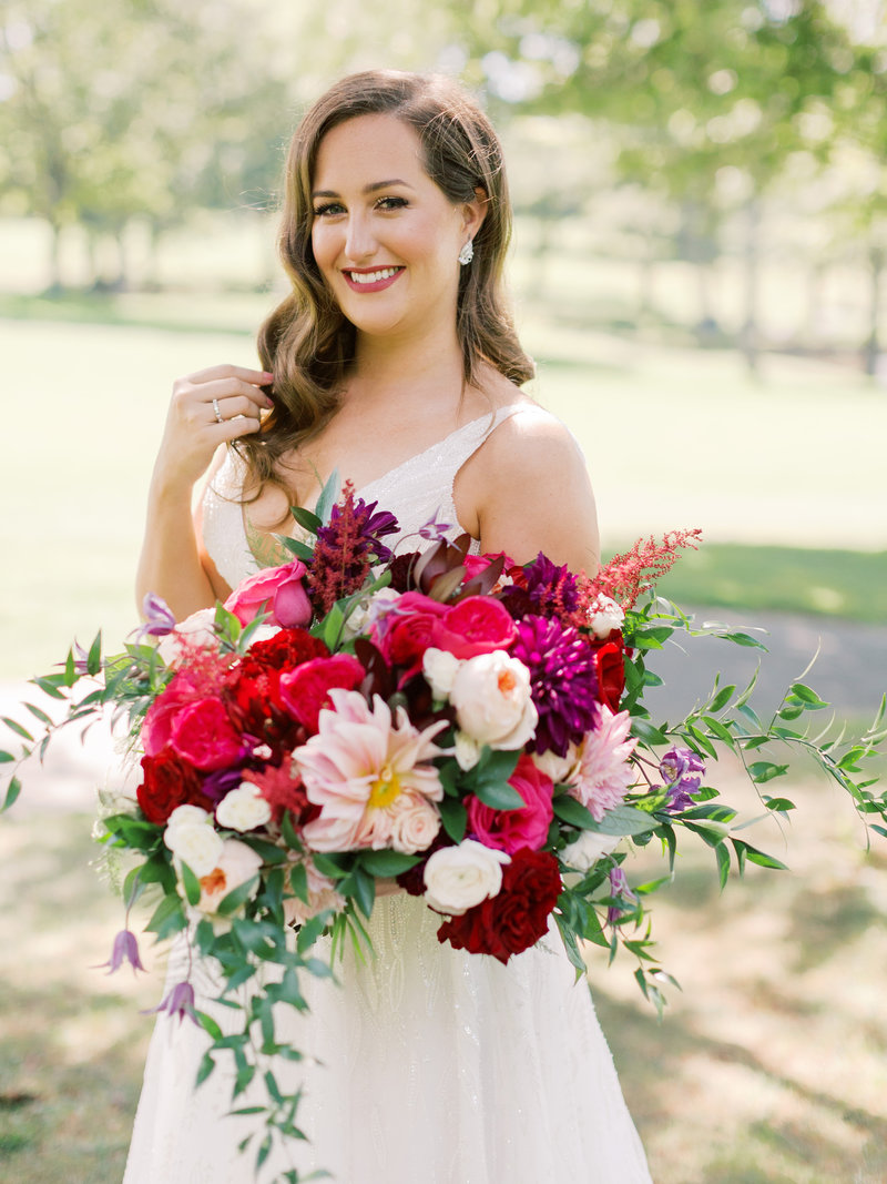 Bridal bouquet with jewel toned flowers and dahlias