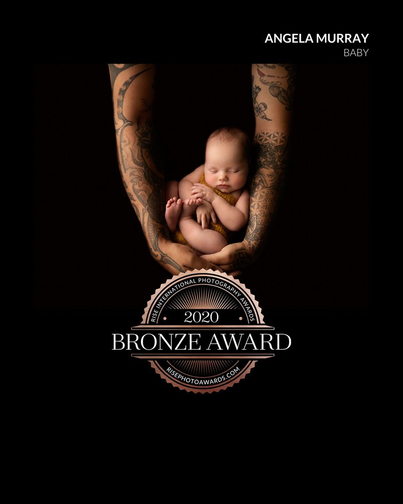 Rise award, dad holding baby girl with my award