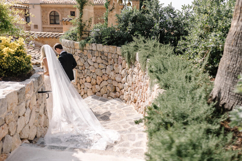 bride and groom kissing during wedding at finca serena in mallorca