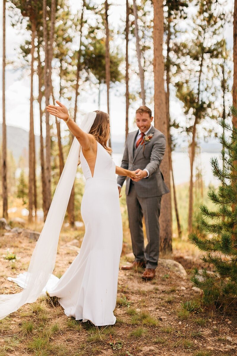 wedding first look in Colorado forest