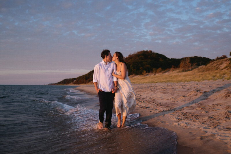 Documentary-style couple's photos in Northern Michigan, showcasing authentic moments.