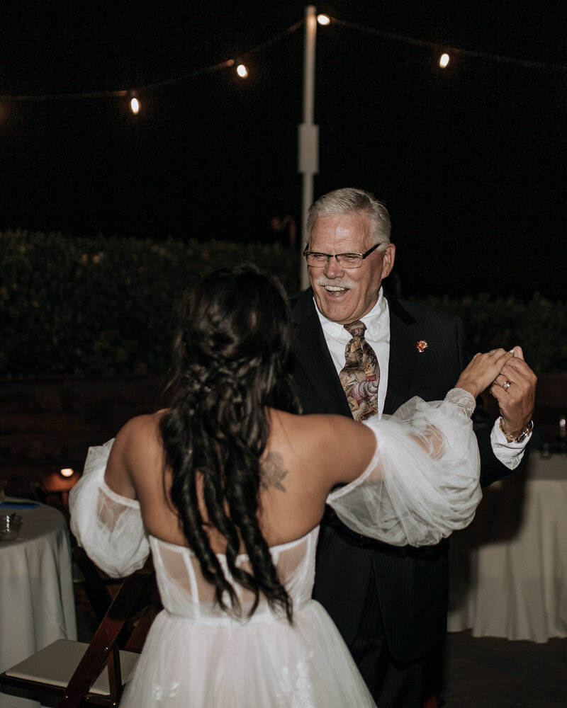 grandfather dancing with the bride at reception