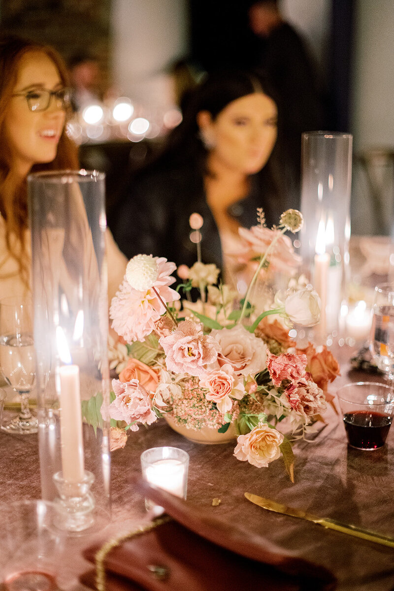 Moody neutral compote centerpiece with taper candles