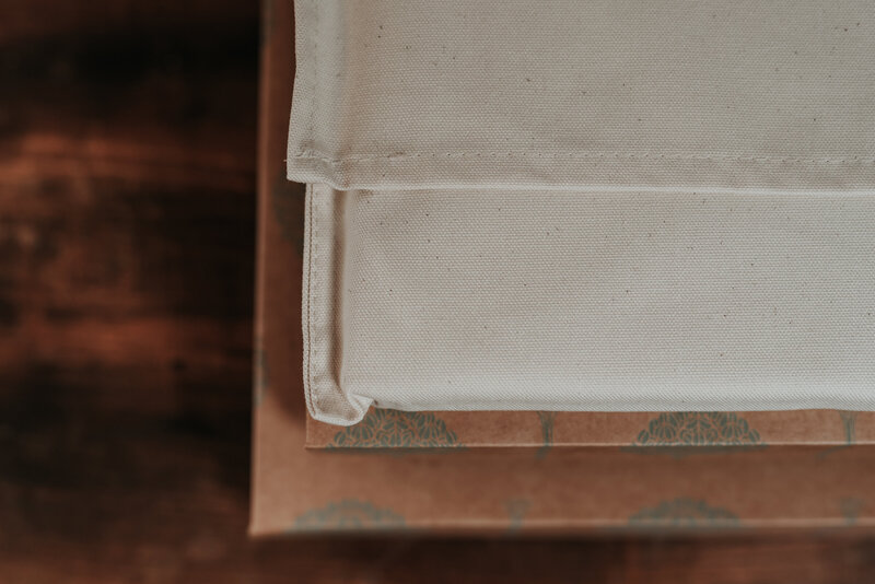 Beautifully presented wedding album packaged in cream cotton sleeve and recycled kraft box